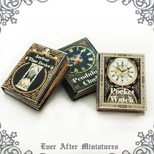 May include: Three miniature books with vintage-inspired covers. The books are titled "Ancient Time Device", "Pendulum Clock", and "Pocket Watch".