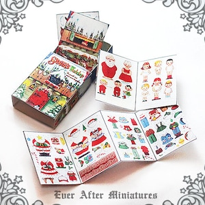 Puede incluir: Un conjunto de muñecas de papel vintage con el tema del taller de Papá Noel. El conjunto incluye una muñeca de papel de Papá Noel, duendes y niños. Las muñecas de papel están impresas en papel blanco con ilustraciones coloridas. El conjunto está empaquetado en una caja de cartón con un diseño festivo.