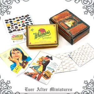 May include: A miniature replica of a Whitman's Sampler chocolate box, with a vintage design and a gold lid. The box is surrounded by miniature cards with images of people and chocolates.