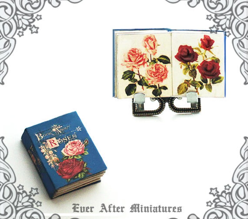 May include: Two miniature books with floral illustrations. The book on the left is blue with the title "Book About Roses". The book on the right is open to show pages with pink and red roses.