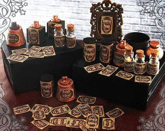 May include: A collection of small glass bottles with cork stoppers and labels that read "Amnesia Potion", "Vampire Repellant", "Love Potion", "Truth of Life", "Morning Potion", and "Draught of Death". The bottles are arranged on a wooden surface with a decorative frame and other potion bottles.