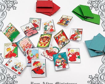 May include: A collection of vintage Christmas cards featuring illustrations of children, Santa Claus, and winter scenes. The cards are printed on white paper with red, green, and blue accents. The cards are arranged in a random pattern on a white background.