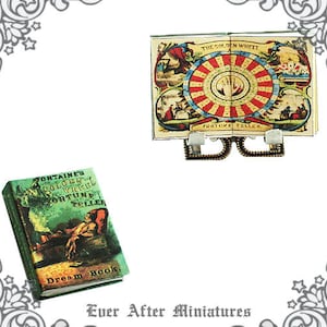 May include: Two miniature books, one titled "Fontaine's Golden Wheel Fortune Teller Dream Book" with a green cover and the other titled "The Golden Wheel Fortune Teller" with a colorful cover depicting a wheel of fortune.