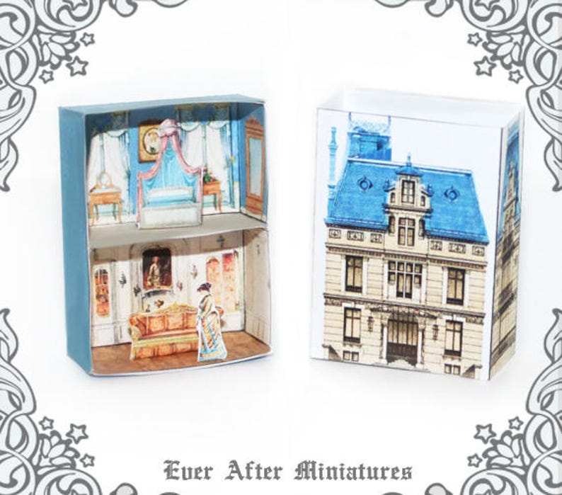 May include: Two miniature dollhouse kits, one depicting a bedroom with a white canopy bed and the other a blue and white Victorian style house. The kits are from Ever After Miniatures.