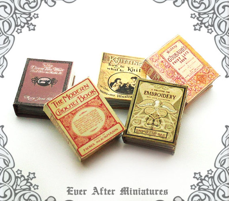 May include: A collection of miniature vintage books with titles like "The Dress You Wear", "The Modern Crochet Book", "Knitting", "A Treatise on Embroidery", and "Madame Goubaud's Point Lace Book".