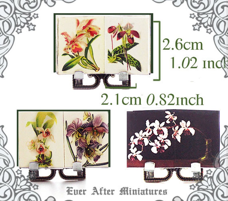 May include: Three miniature books with floral illustrations. The books are 2.1 inches wide and 0.82 inches tall. The covers feature orchids, a pink and white orchid, a purple orchid, and a white orchid.