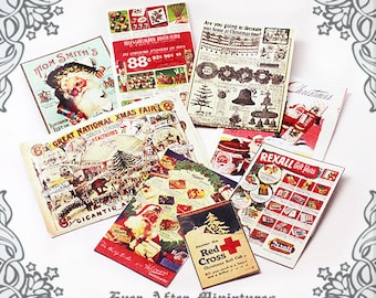 Puede incluir: Una colección de efímeras de Navidad vintage, que incluyen anuncios de una feria navideña, una guía de regalos navideños y una revista con temática navideña. Las efímeras presentan ilustraciones de Papá Noel, árboles de Navidad y otros símbolos navideños.