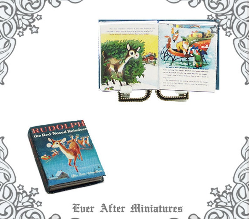 May include: A miniature book titled "Rudolph the Red-Nosed Reindeer" with a red and white illustration of Rudolph on the cover. The book is open to a page with a colorful illustration of Rudolph, a reindeer, in a forest setting. The book is part of a set of miniature books.
