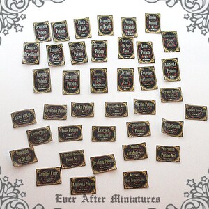 May include: A collection of 30 miniature potion bottles with black and gold labels. Each bottle has a different potion name, such as "Vampire Repellant", "Zombie Cure", "Draught of Death", and "Love Potion".