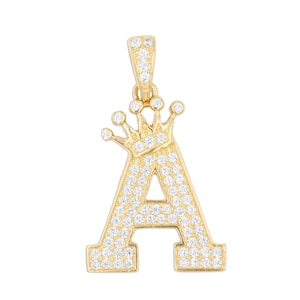May include: A gold pendant with a letter A and a crown of cubic zirconia stones.
