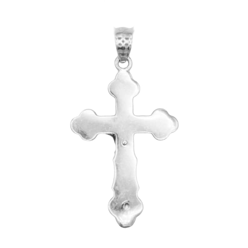 May include: A silver cross pendant with a detailed design. The cross has a loop at the top for attaching to a chain.