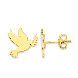 May include: A pair of gold-colored stud earrings. Each earring features a dove silhouette carrying an olive branch. The earrings are designed with a post and butterfly backing for secure wear. The dove design is a symbol of peace.
