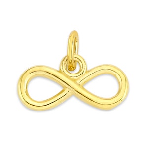 May include: A gold infinity symbol charm pendant. The pendant has a loop at the top for attaching to a chain or bracelet.