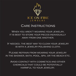 May include: Black and white text on a black background with the words "ICE ON FIRE JEWELRY" and "CARE INSTRUCTIONS". The text provides instructions on how to care for jewelry, including storing pieces individually, cleaning with a polishing cloth, and avoiding contact with cosmetics.