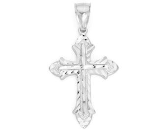 May include: A silver cross pendant with a diamond-cut design. The cross has a traditional shape with a pointed top and bottom.