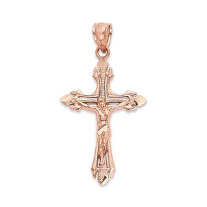 May include: Rose gold crucifix pendant featuring a detailed depiction of Jesus Christ on the cross. The pendant has an ornate design with textured surfaces and a polished finish. The bail is integrated into the cross's top.