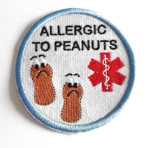 Stryk-på-överföring Broderad applikation med allergi mot jordnötter.