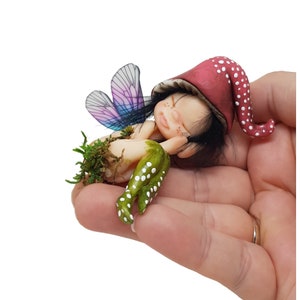 Sleeping forest fairy. Decorative porcelain cold porcelain fairy figurine elf, fairy elf lying down