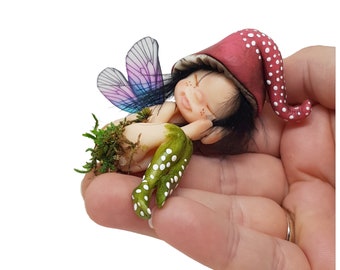 Sleeping forest fairy. Decorative porcelain cold porcelain fairy figurine elf, fairy elf lying down