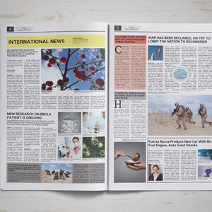 Pu&ograve; includere: Una pagina di giornale aperta con due articoli. L'articolo a sinistra tratta di nuove ricerche sui pazienti affetti da Ebola. L'articolo a destra tratta della dichiarazione di guerra e del tentativo delle Nazioni Unite di fare pressione sulla nazione affinch&eacute; riconsideri. Il titolo dell'articolo a destra recita "WAR HAS BEEN DECLARED, UN TRY TO LOBBY THE NATION TO RECONSIDER".