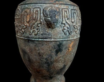 Rare Archaic Ritual Chinese vessel Hu featuring taotie, dragons and liewen thunder design 11” tall