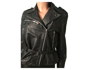 Vintage black Berman’s genuine leather motorcycle jacket with embossed stitching on shoulder and elbows, size large