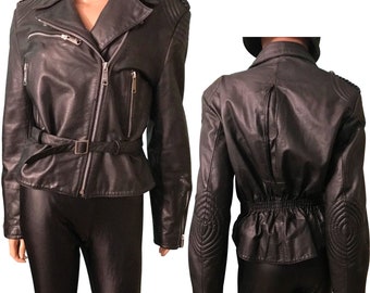 Vintage black Berman’s genuine leather motorcycle jacket with embossed stitching on shoulder and elbows, size large