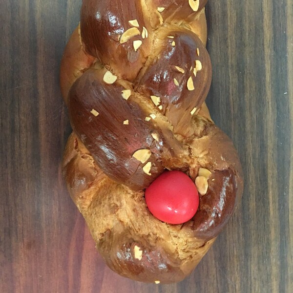 Greek Tsoureki bread with egg, Greek Easter Bread, Challah bread loaf, vasilopita