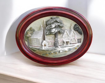 3D wall plaque, oval brush stroke relief cottage scene
