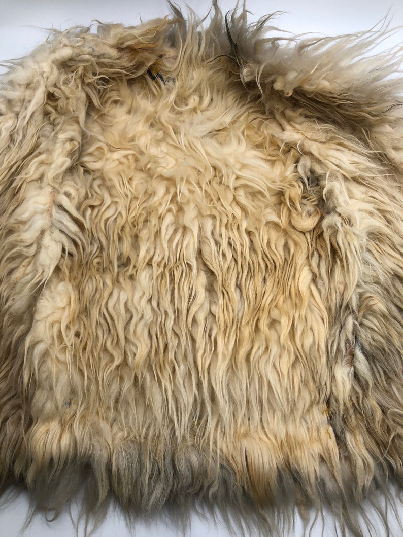 Orange real suede vest with embroidery with sheep skin lining unisex size S.