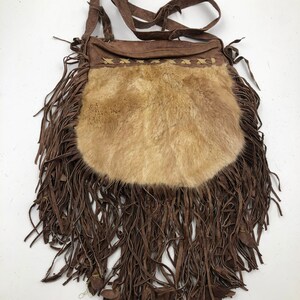 Brown small leather purse with beige fur