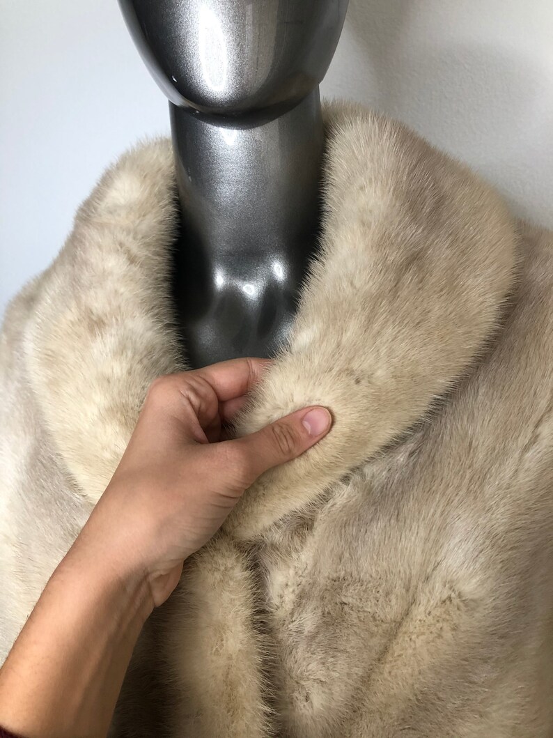 Beige red carpet mink fur bolero.