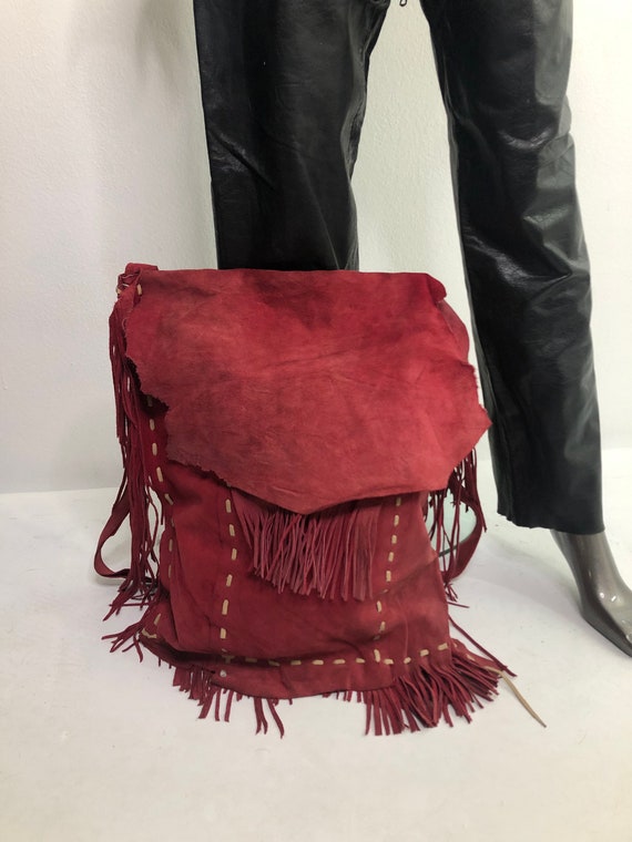 Red real suede crossbody bag with fringe with pock