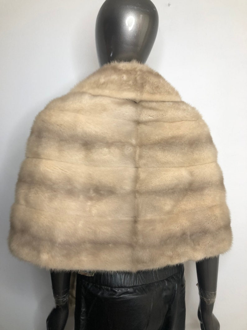 Beige red carpet mink fur bolero.