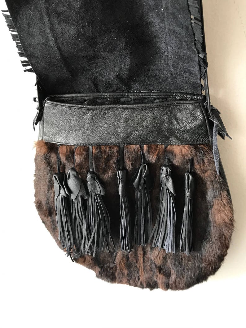 Women/'s dark brown handmade handbag made of leather and rabbit fur on a long handle with fringe and original details made in the USA.