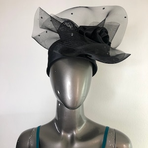 Black elegant silk mini hat with decorative element rose woman.