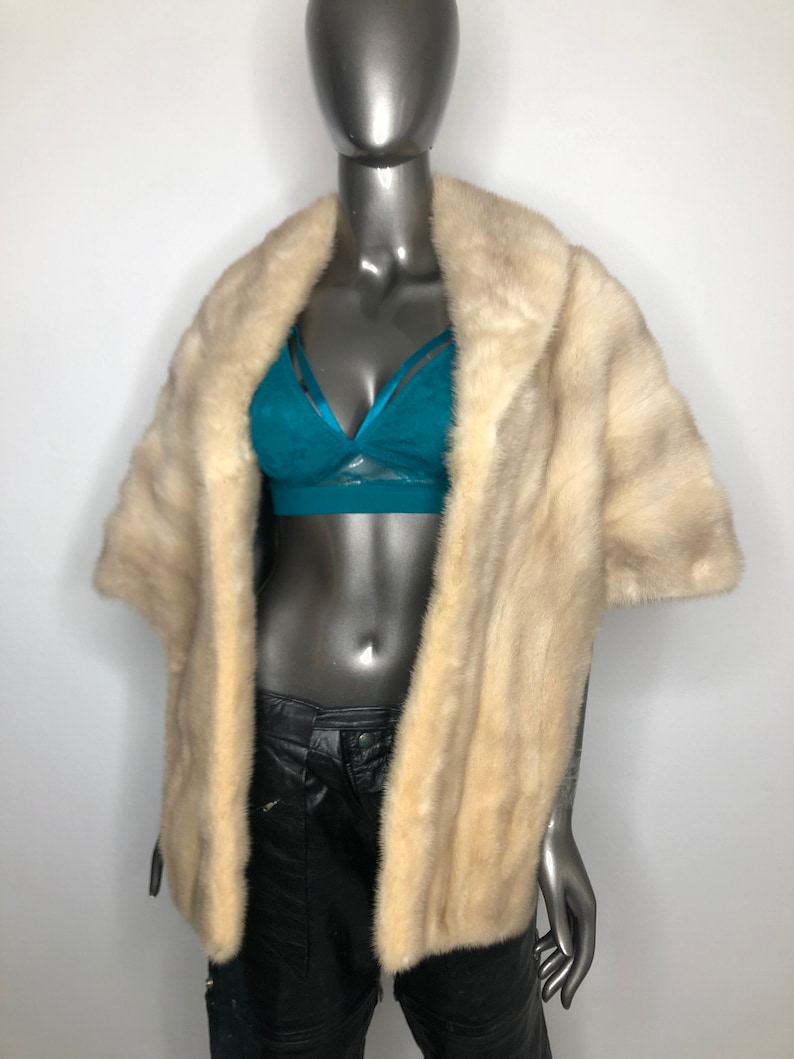 Beige red carpet mink fur bolero.