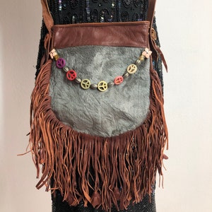 Orange with grey real leather faux fur shoulder bag with fringe with pockets.