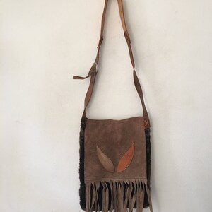 Vintage style new fur bag collection , size medium .