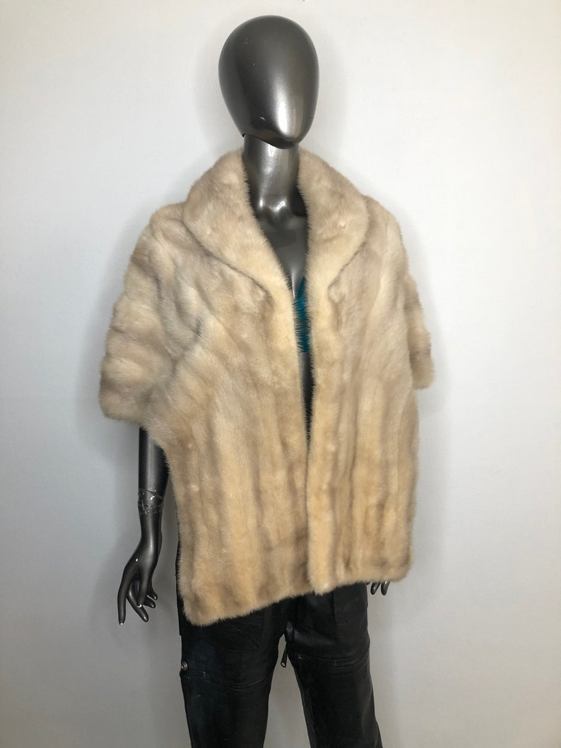 Beige red carpet mink fur bolero.