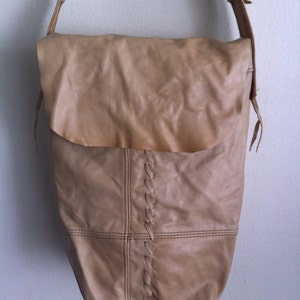 Beige Leather Designer Big Bag Shoulder Crossbody bag on a long strap made by designer Charlize and Kyle Couture.