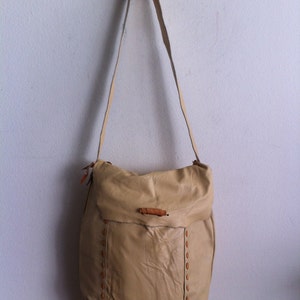 Women&#39;s new beige big shoulder bag on a long strap, a bag made of genuine leather with  original details; made in USA.