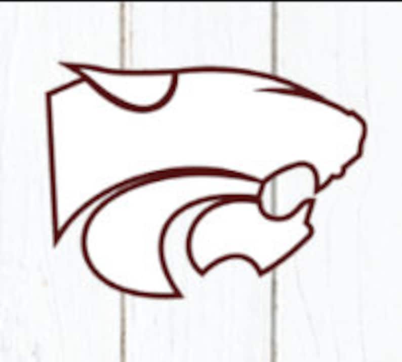 May include: A brown and white stylized illustration of a panther's head, facing right. The panther's head is outlined in brown, and the inside is white. The panther's mouth is open, and its teeth are visible. The panther's eyes are black.