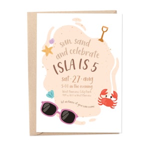 May include: A beach-themed birthday party invitation with a pink and white background. The text reads "Sun, Sand and Celebrate Isla is 5" with the date "Sat 27 Aug" and time "5:00 in the evening". The invitation also includes a starfish, seashells, sunglasses, a shovel, and a crab.