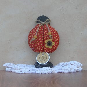 May include: A set of three ceramic mugs with a speckled, matte finish. The mugs are in shades of cream, light gray, and dark gray. Each mug has a simple, minimalist design, perfect for coffee or tea.