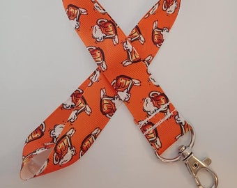 Oranges Schlüsselband mit Biermotiv