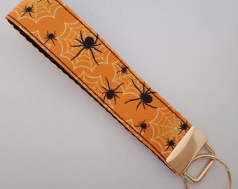 Orange and black spider web / Halloween key fob wristlet