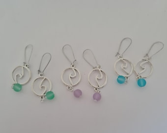 Silver wave charm dangle earrings with beads