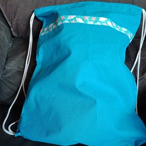 Turquoise blue drawstring beach / swimming bag