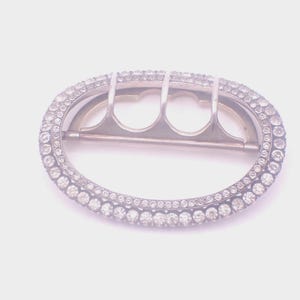 May include: A set of three ceramic mugs with a speckled, matte finish. The mugs are in shades of cream, light gray, and dark gray. Each mug has a simple, minimalist design, perfect for coffee or tea.